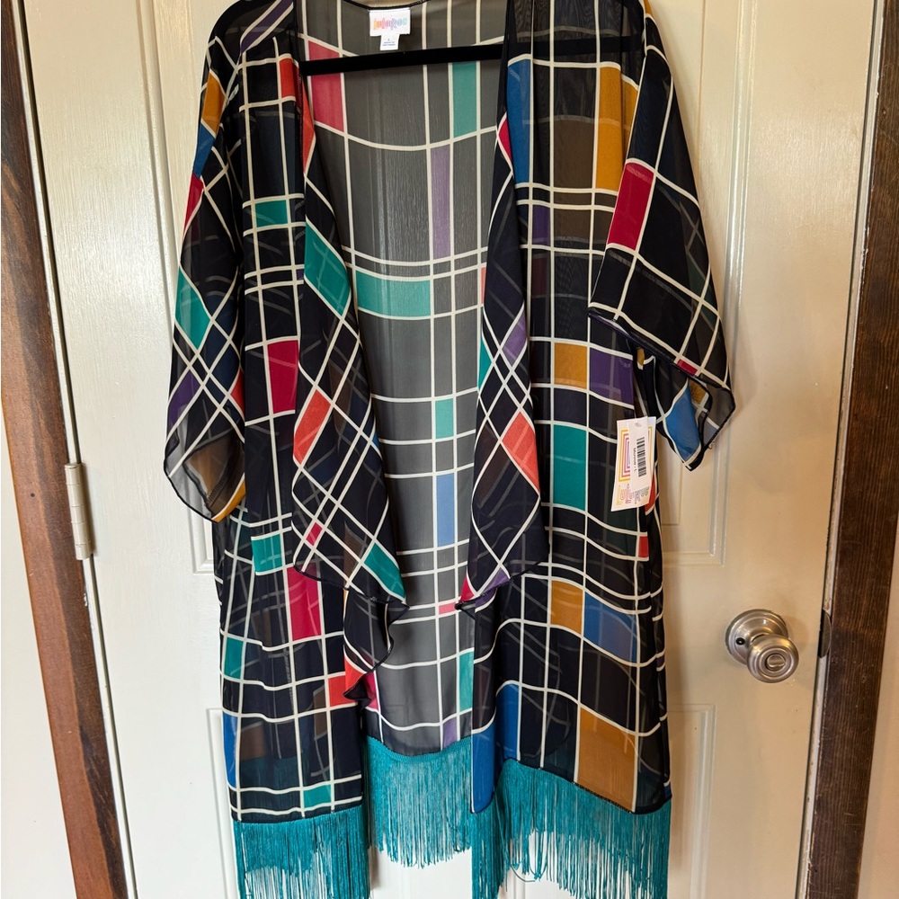 LuLaRoe Monroe Semi-sheer, lightweight jacket, or coverup.